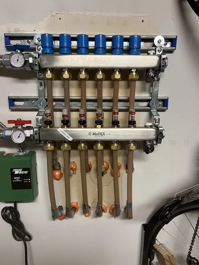 Plumber performing Water Heater Repair at a residential property in Strasburg